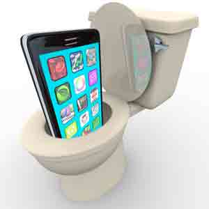 A colorful smartphone displaying various app icons sits inside a white porcelain toilet bowl with the lid raised.