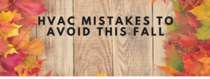 Autumn leaves on wooden background with text reading HVAC Mistakes to Avoid This Fall.