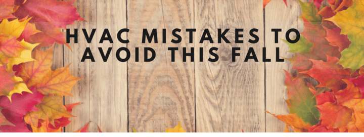 Autumn leaves on wooden background with text reading HVAC Mistakes to Avoid This Fall.