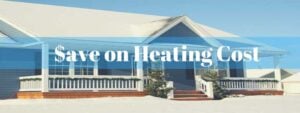 Modern blue house with white trim and covered porch displaying text overlay 'Save on Heating Cost'.