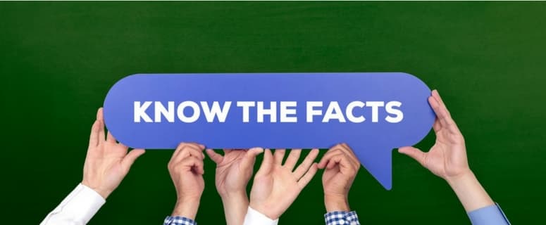 Multiple hands holding a blue speech bubble with white text reading 'KNOW THE FACTS' against a green background.